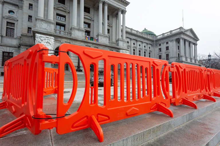 Orange barricades outside a government building