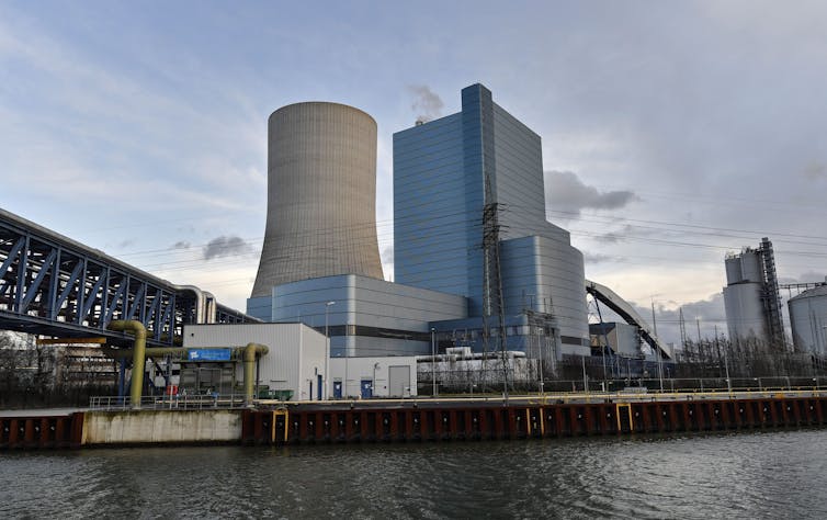Stack and buildings for a coal power plant on a waterfront