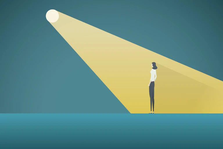 Ilustración de foco iluminando a una mujer.