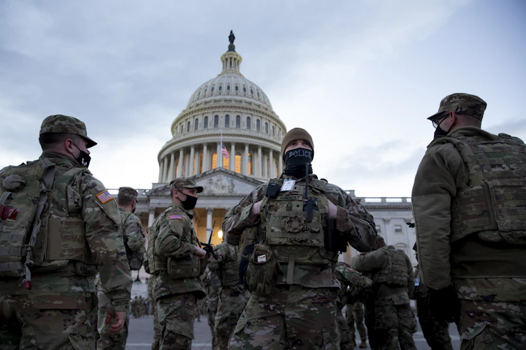 US military personnel guard the Capitol Building in Washington