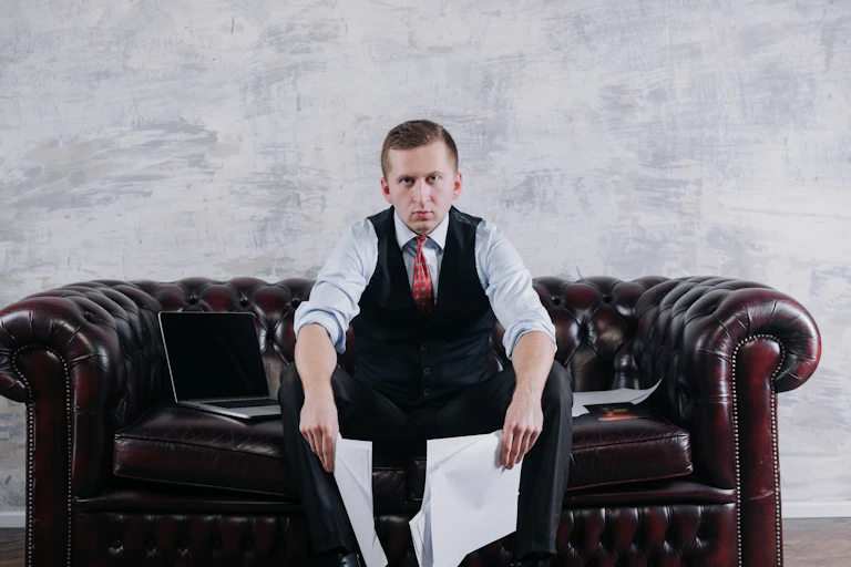 Man reading a boring report
