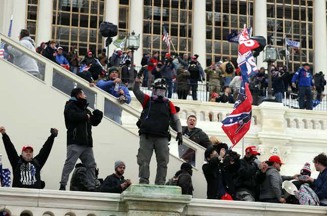 Rioters gather on the steps of the U.S. Capitol Jan. 6