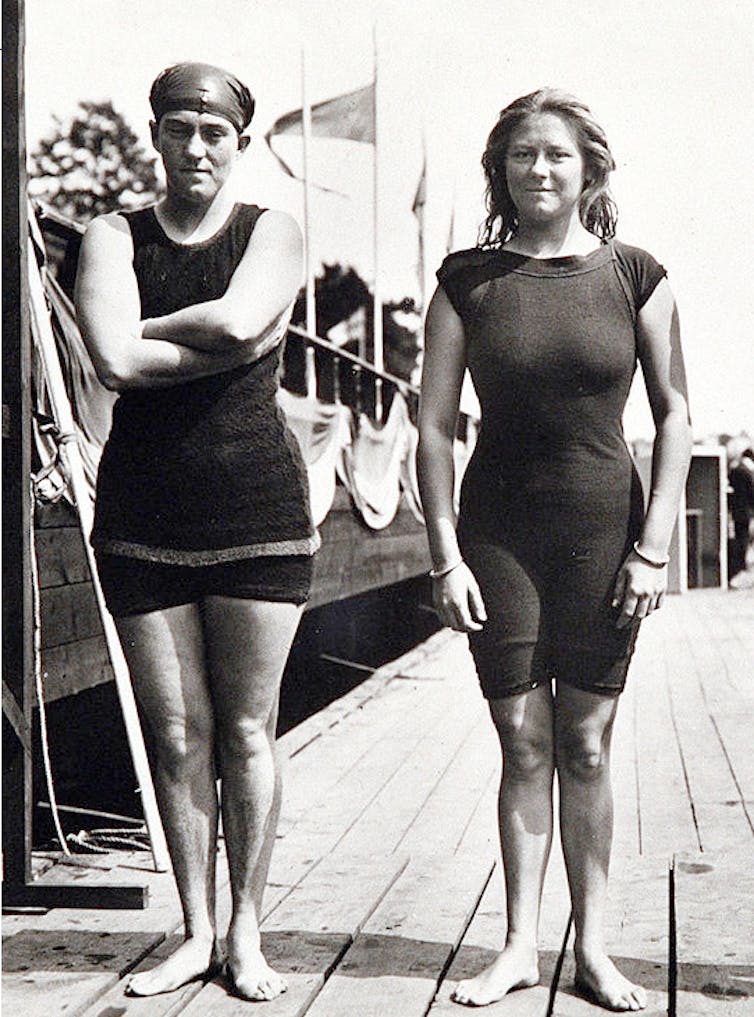 Two women in heavy bathing suits.