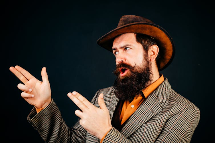 Image of a macho-looking man with a big beard.