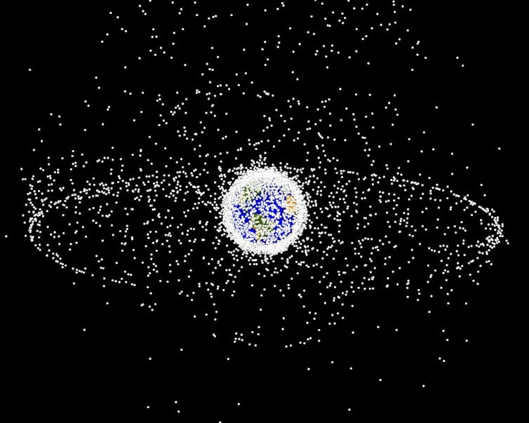 A computer-generated image of space debris around Earth.