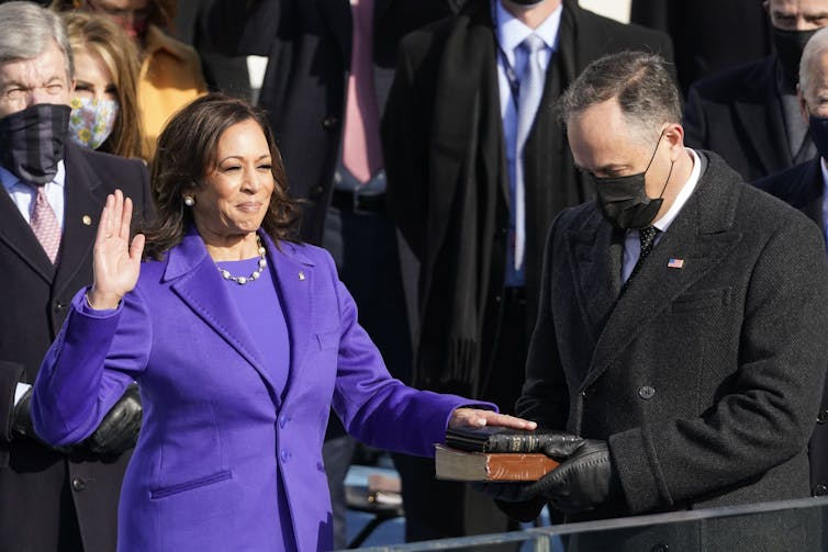 Kamala Harris is sworn in on a Bible