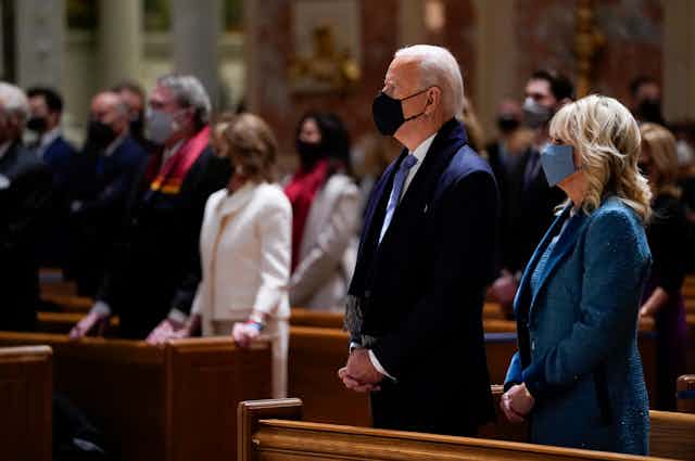 President-elect Joe Biden and his wife Jill Biden attend Mass at the Cathedral of St. Matthew the Apostle during Inauguration Day ceremonies Wednesday, Jan. 20, 2021, in Washington.
