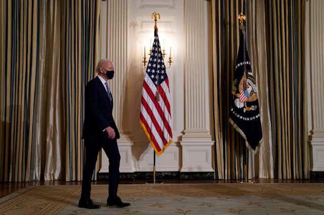 President Joe Biden arrives to swear in political appointees at a virtual ceremony at the White House on January 20 2021.