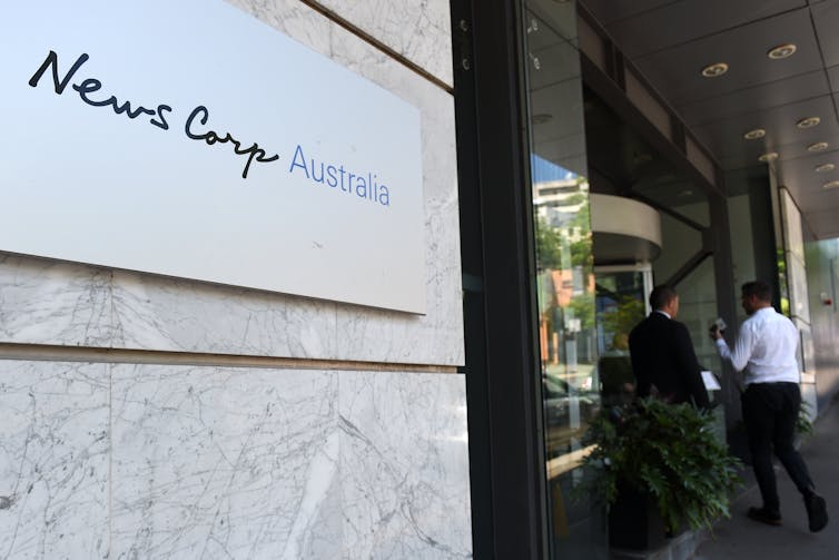 News Corp logo outside offices.