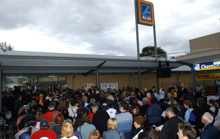 Shoppers queue for bargains at Aldi's store in Heidleberg West, Melbourne.