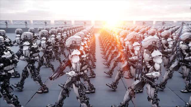 Hundreds of robots holding guns marching.
