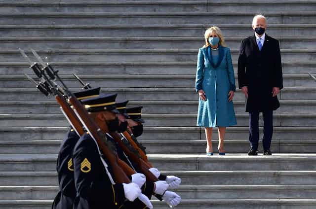 Joe and Jill Biden inspect the troops at the U.S. Capitol.