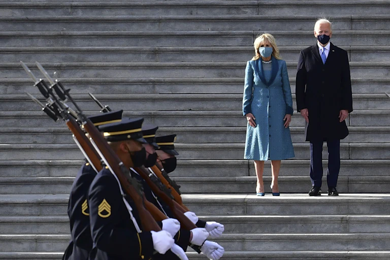 Joe and Jill Biden inspect the troops at the U.S. Capitol.