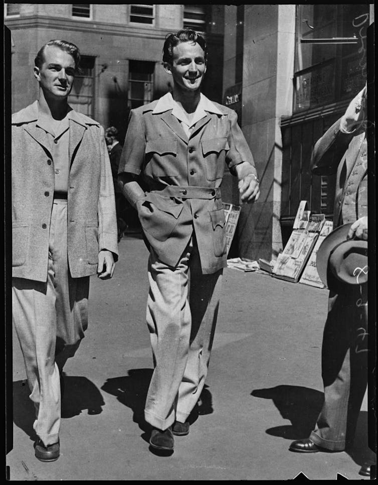 Two men in suits in 1947.