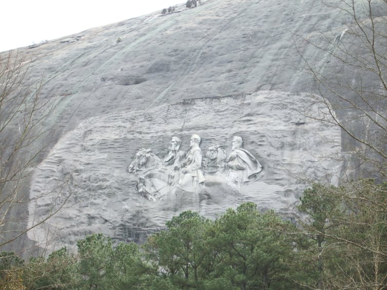 Carved stone on the side of a mountain
