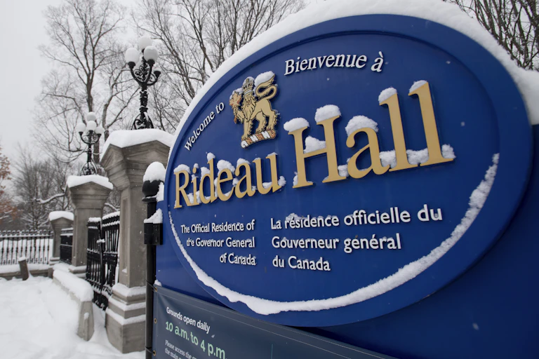 The sign to Rideau Hall in Ottawa is covered in a new dusting of snow