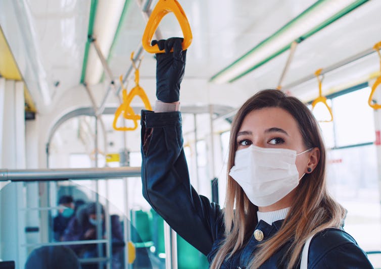 Student on a city bus.
