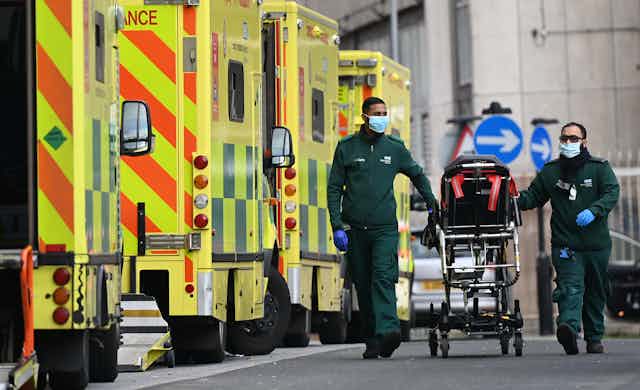 Ambulance staff outside the Royal London hospital in London, England.