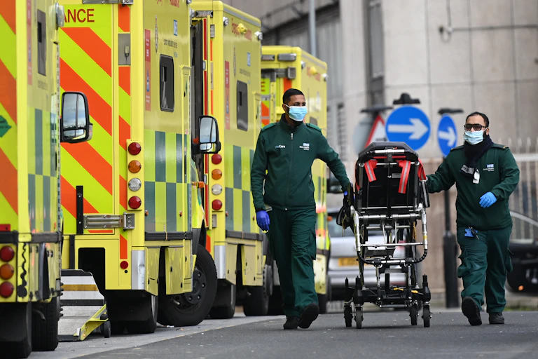Ambulance staff outside the Royal London hospital in London, England.