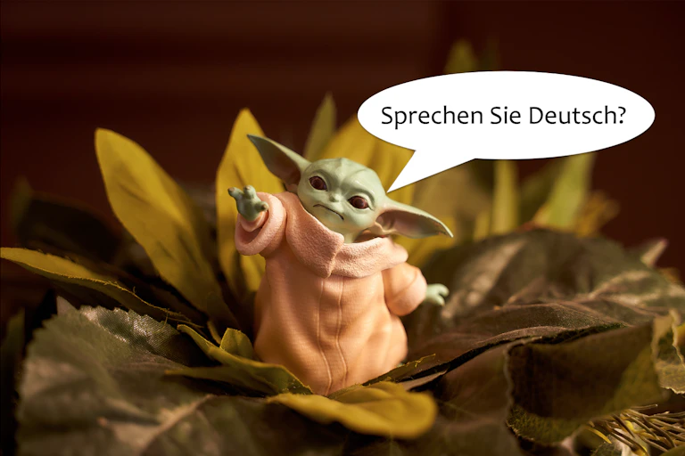 un baby yoda con un bocadillo de cómic en el que pregunta si habla alemán.