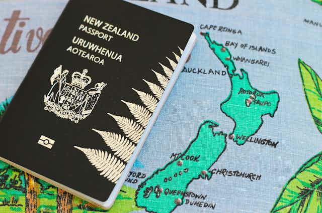 New Zealand passport on map of New Zealand