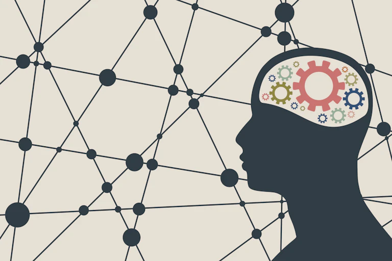 silhouette of a head with gears in it