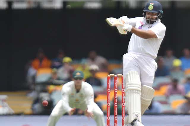 Still of Rishabh Pant of India hitting a cricket ball.