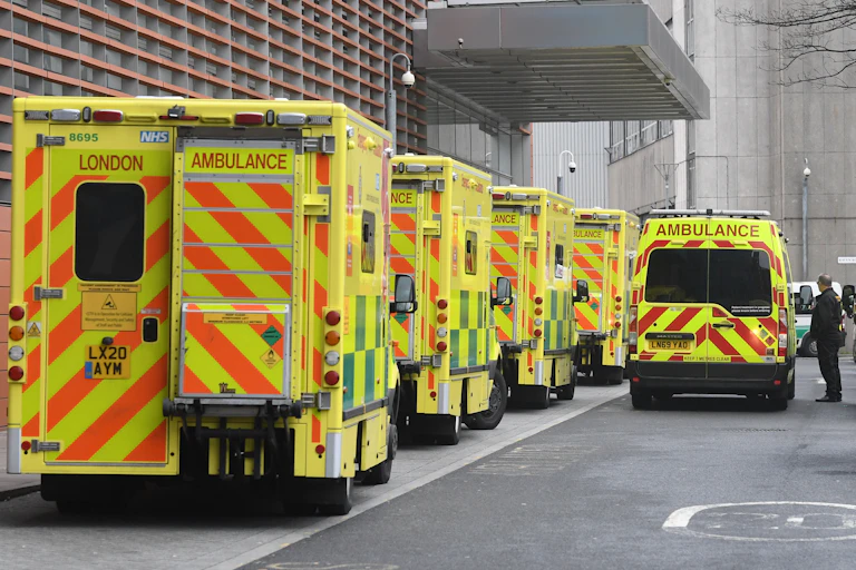 A queue of ambulances outside a London hospital.
