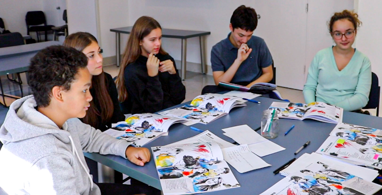 A group of youth in a pre-venture workshop
