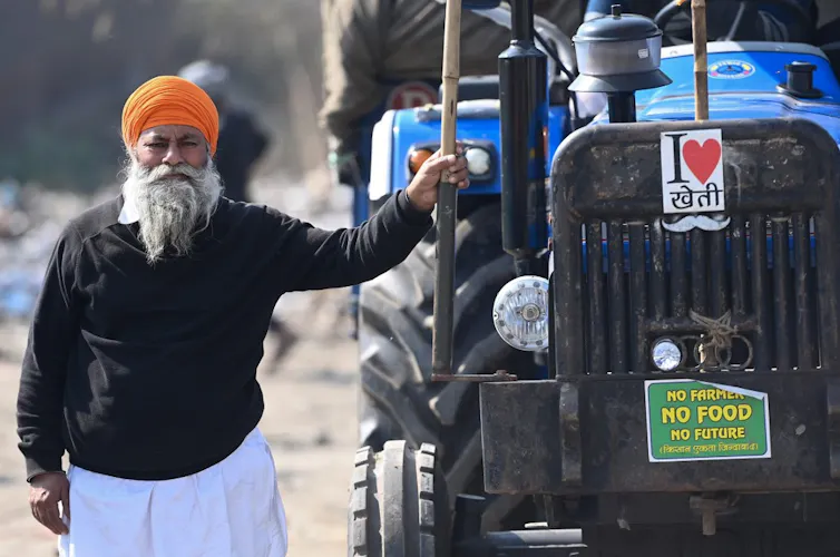 Un agriculteur proteste contre les récentes réformes agricoles du gouvernement indien.