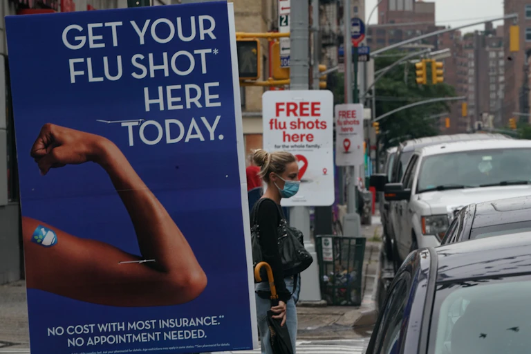 posters advertise flu shots