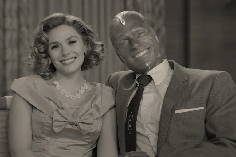Black and white image of a 50s couple, the husband is a robot.
