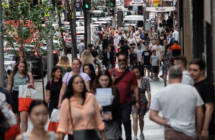 Crowds in street in Melbourne CBD.