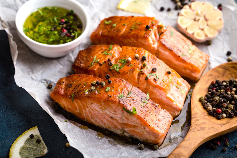 A plate of cooked salmon.