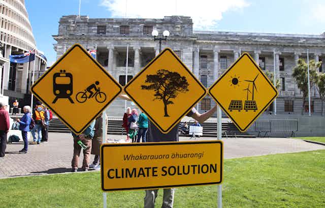 Banners calling for climate solutions