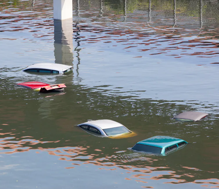 Rain inundates cars.