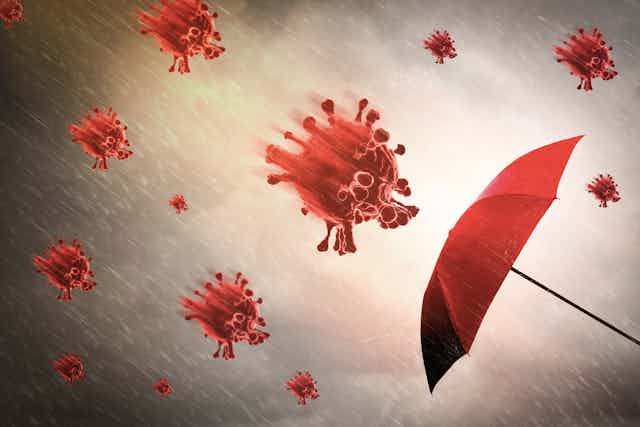 Dibujo de un paraguas rojo sobre el que se precipitan virus