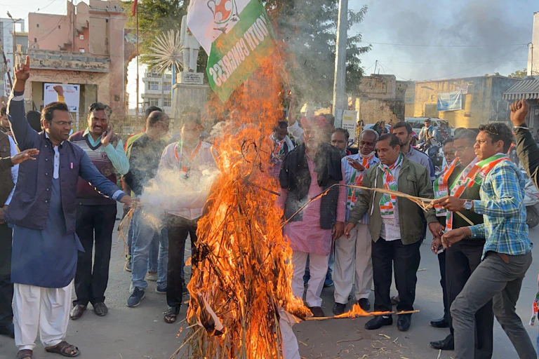Indian farmer protesters burn effigy of Prime Minister Modi in the street