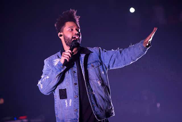 An image of The Weeknd performing