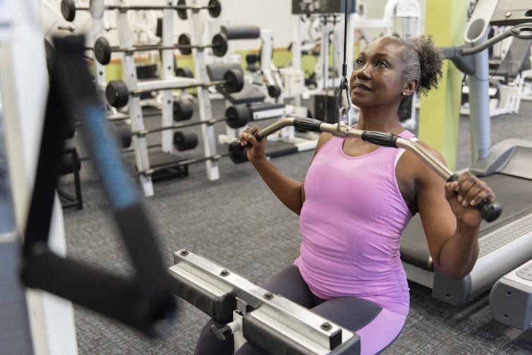 A woman lifting weights.