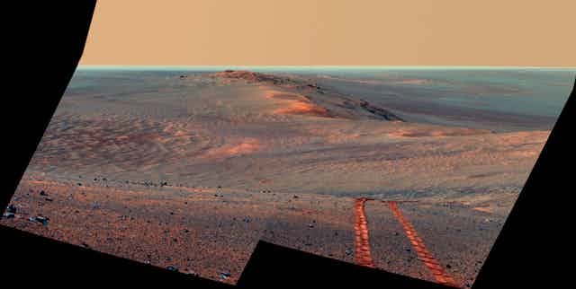 Tracks in the Martian sand.