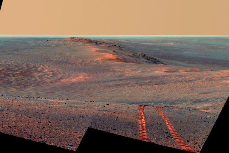 Tracks in the Martian sand.
