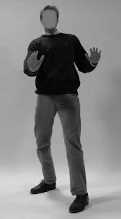 A black and white photo of a scared-looking man