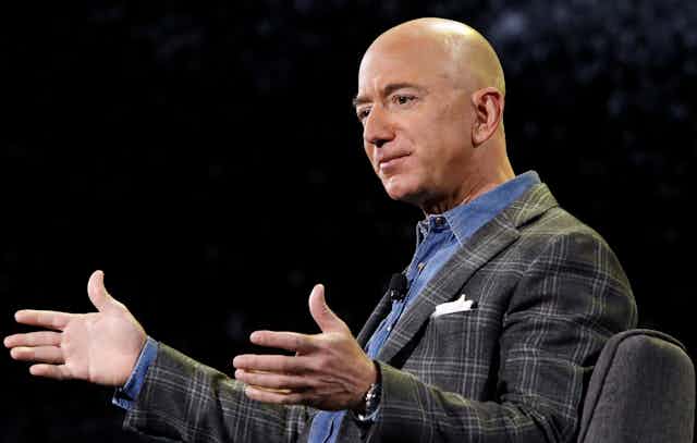 Jeff Bezos speaks at a conference. 