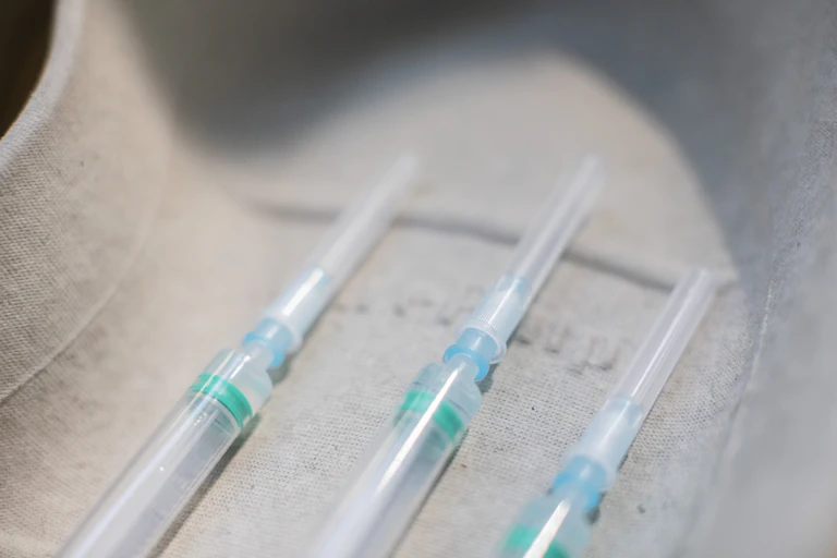 Vaccine syringes