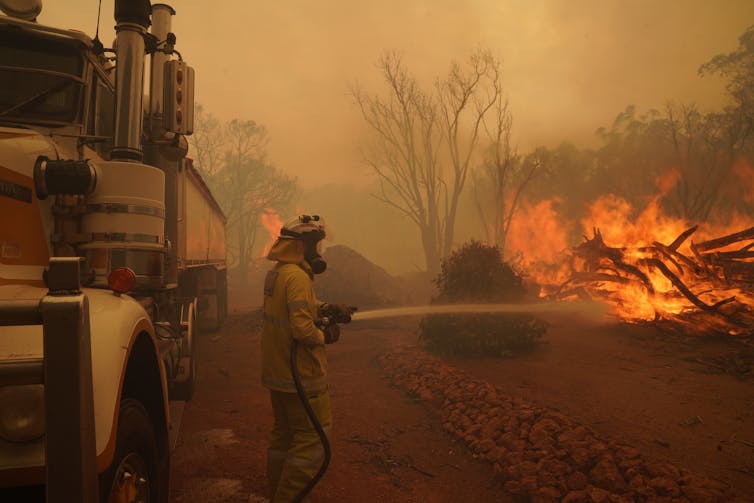 Firefighters battle flames in Western Australia.