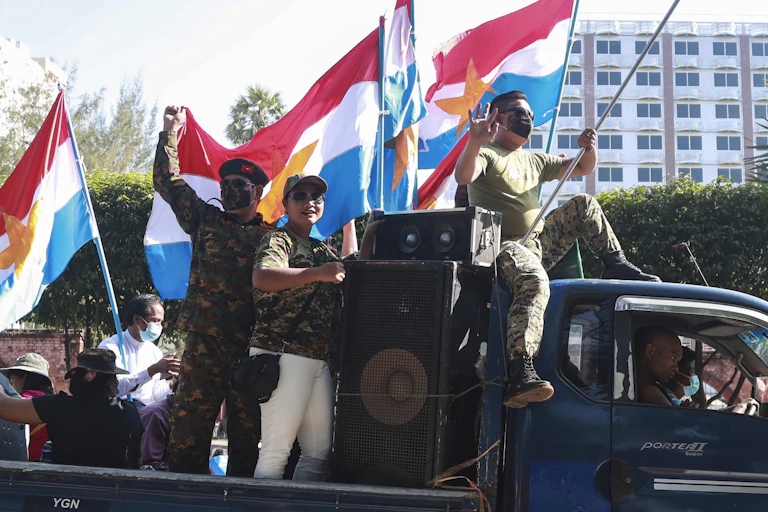 Myanmar, military coup, supporters waving flags