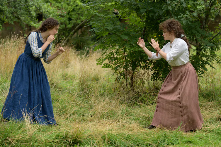 Two women fighting.