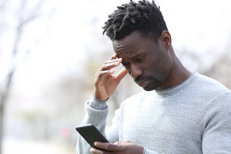 Man looking at his phone