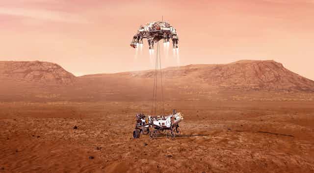 An illustration of NASA’s Perseverance rover landing on Mars.